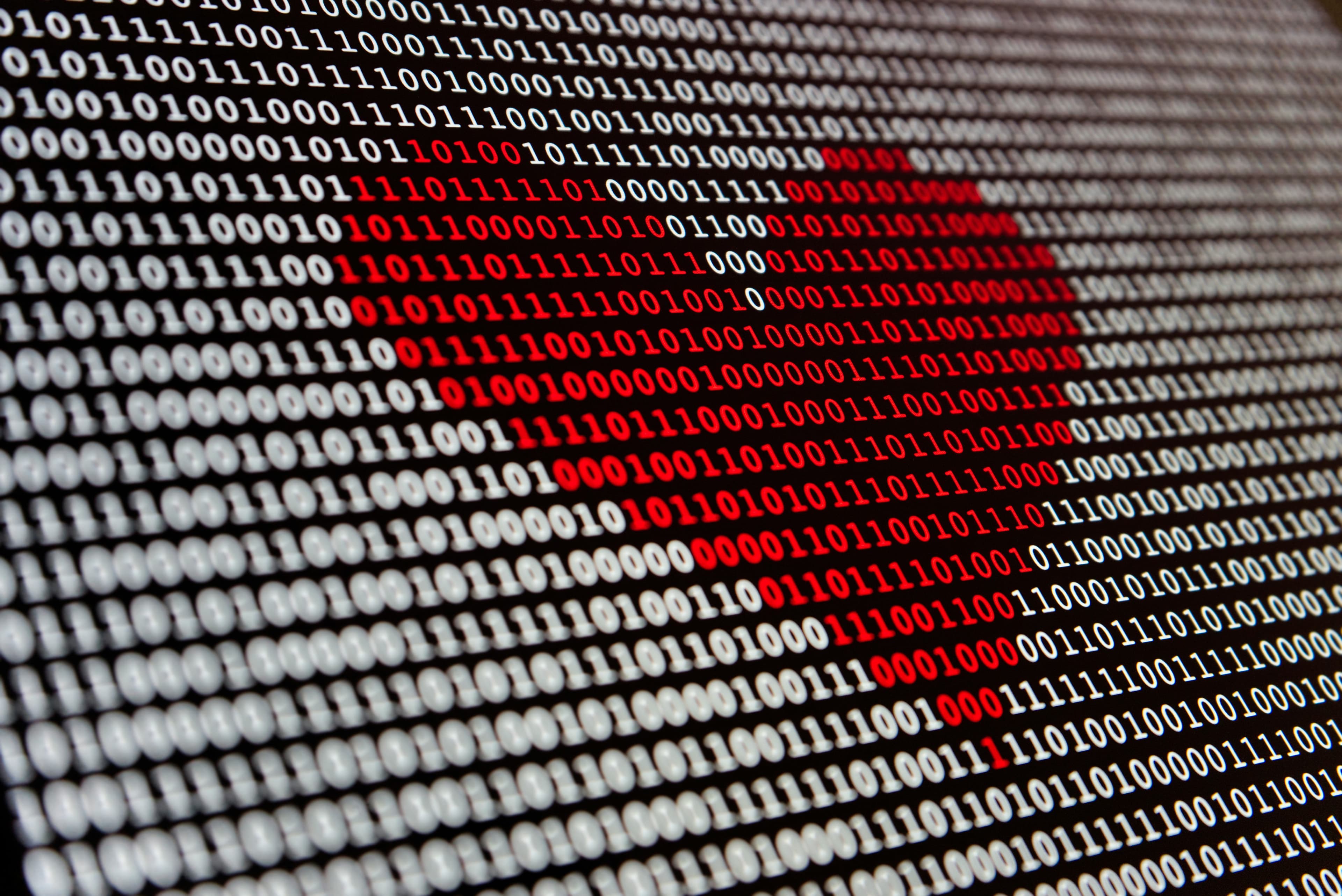 Heart shape made from binary digits representing digital identity and dating profile verification